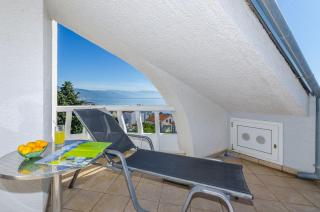 Traumhaftes Apartment mit beeindruckendem Meerblick und mediterranem Garten - 7