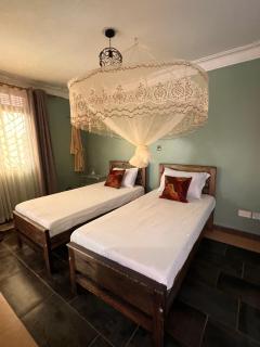 Mufasha Boutique Suites - 7