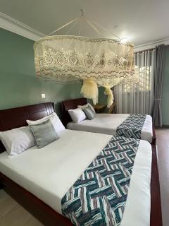 Mufasha Boutique Suites - 6
