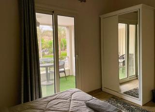 Cozy 2BR Retreat with Green Views, Minutes from the Airport - 9