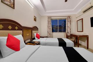 Capital O Elegant Amethyst Business Hotel Near Ragigudda Sri Prasanna Anjaneyaswamy Temple - 1