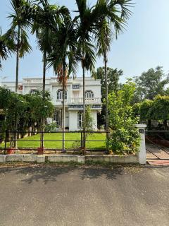 Shantiniketan Bungalow with green lawn - 9