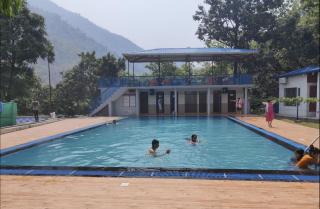 Shri Bhagrith Resort pool and restaurant - 5