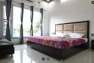 Shri Bhagrith Resort pool and restaurant - 2