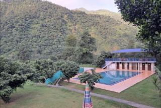 Shri Bhagrith Resort pool and restaurant - 0