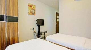 OYO 90597 Delightful Holiday Inn - 8