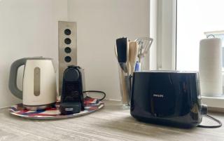 Rooftop Central Apartment with Balcony & Free Parking - 1