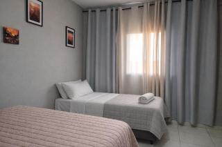 Quarto Quádruplo Família 8 min Aeroporto em pousada - 9