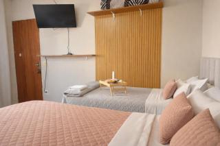 Quarto Quádruplo Família 8 min Aeroporto em pousada - 5