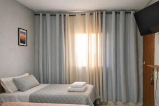 Quarto Quádruplo Família 8 min Aeroporto em pousada - 3