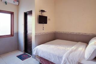 Urbanview Hotel Syariah Griya Asri Patran near Tugu Station - 1