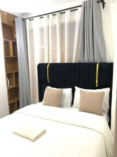 Metro Retreat 2-Bedroom Furnished Apartment - 2