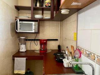 Merendon Suite Apartamento - 1