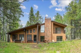 Bragg Creek Vacation Estate with hot tub, sauna, pool table, karaoke, private pond and forest trails - 0