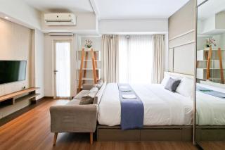 Cozy and Luxury 1BR Apartment at Scientia Residence By Travelio - 9