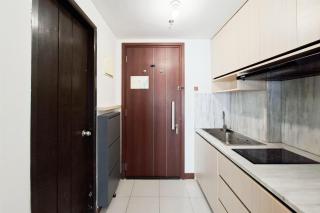 Cozy and Luxury 1BR Apartment at Scientia Residence By Travelio - 1