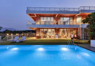 SaffronStays Euphoria - 7BR luxury pool villa with river view, lawns, BBQ & bonfire, perfect for celebrations in Karjat - 0