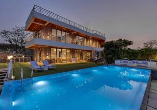 SaffronStays Euphoria - 7BR luxury pool villa with river view, lawns, BBQ & bonfire, perfect for celebrations in Karjat - 4