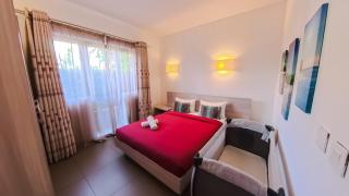 Azuri Ocean & Golf Village - Elegant 3-Bedroom Apartment with Private Garden, Beach & Pool Access in Roches Noires - 3