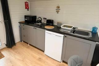 1-Bed Log Cabin in Parc Pen y Bryn Sleep 2 3 - 7