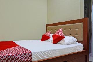 Hotel O Orange Homestay Makassar - 9