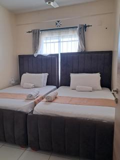 Cozy 2 BR with 3 Beds, AC & Hot Shower at Buxton Point Apartments Off RG Road Gate A - 6