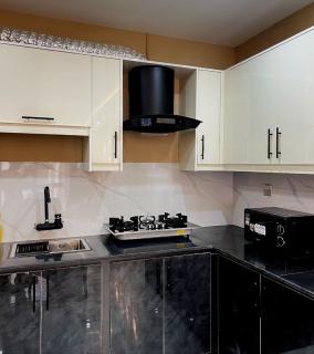 1BHK Cozy Home Cinema - 9