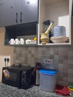 Cozy 2 BR with 3 Beds, AC & Hot Shower at Buxton Point Apartments Off RG Road Gate A - 2