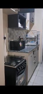 Cozy 2 BR with 3 Beds, AC & Hot Shower at Buxton Point Apartments Off RG Road Gate A - 4