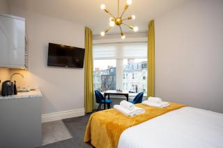 StayCoastal Linden Hotel King Deluxe Suite 4 - 9