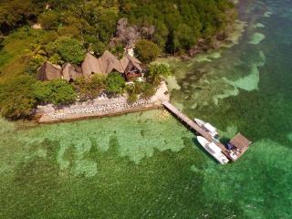 Accommodation on a coral island with turquoise sea - 0