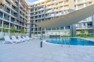 Vogue The Gate Abu Dhabi near Yas Island & Ferrari World One Bedroom Apartment with Balcony, Pool & Gym Access - 1