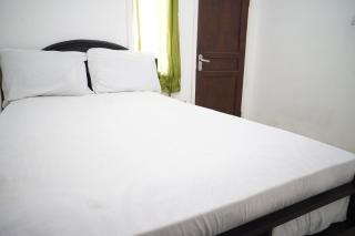 Hotel O Aero Kost Bu Lisa Syariah Near Pasar Tradisional Lawang - 1