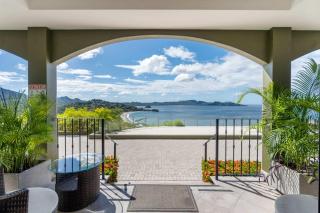 Luxury Condo with Panoramic Ocean Views, Sparkling Infinity Pool, and Modern Open-Concept Design - 0