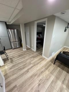 Two cozy bedroom in a modern basement - 2