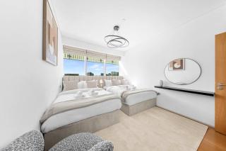 Modern Coastal Escape with Private Beach Access - 4