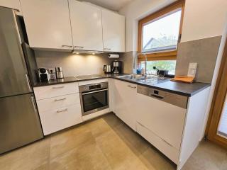 Modernes Ferienhaus mit großer Küche, Terrasse & Garten - 9