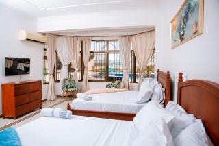 Spacious Apartment in Dar es Salaam with City, Ocean, and Pool Views - 5