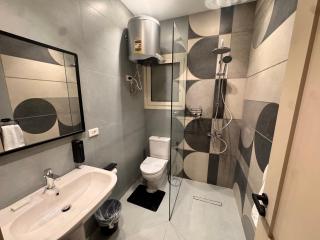 832 . Modern 1BR Apartment Prime Location - 3