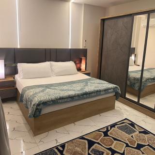 شقة فندقية بغرفتين قرب مول مصر وميدان جهينة - 9