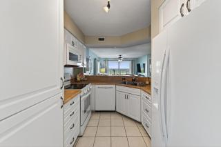 Direct oceanfront 2/2 corner condo with large balcony, heated pool, and garage parking - 6