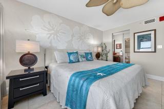 Direct oceanfront 2/2 condo with a private balcony, heated beachfront pool, and garage - 1