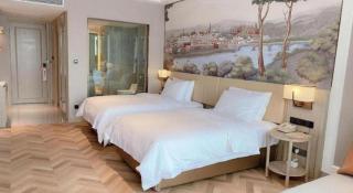 Vienna Hotel Lincang New Asia Pacific Times Square - 8