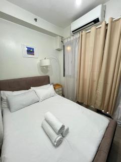 Warm Retreat with Balcony at Shore 2 Residences - 1