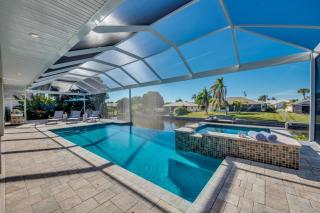 CoralVilla Pure Elegance - prime boat location, pool, hot tub, outdoor kitchen - 5