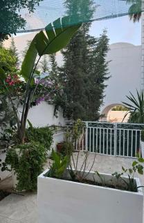 Luxueux Appartement 70m2-Rez de chaussée- pied dans l'eau-10 m de la Piscine collective- centre ville d'Hammamet,dans la partie residentielle de l'hôtel Dar Hayet-1 suite Parentale-1 chambre avec 1 grand lit double-Grande terrasse - 9