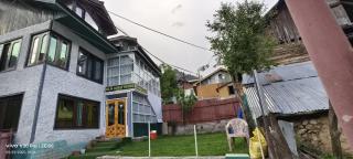 Hotel Raja Guest House Pahalgam രാജ ഗസ്റ്റ് ഹൗസ് പഹൽഗാം - 0