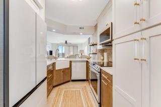 Renovated direct oceanfront corner 2/2 with a large balcony, heated pool, and garage - 6