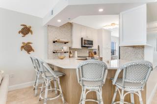 Renovated direct oceanfront corner 2/2 with a large balcony, heated pool, and garage - 1