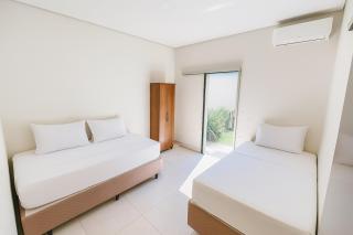 a Casa Paradisiaca ll Piscina Quente Aquecimento Elétrico, Com Led e Hidromassagem, Sauna, Ofurô Quente , Roupa de Cama e Banho e Aceitamos Pet, Todos Ambientes com Ar Condicionados - 1